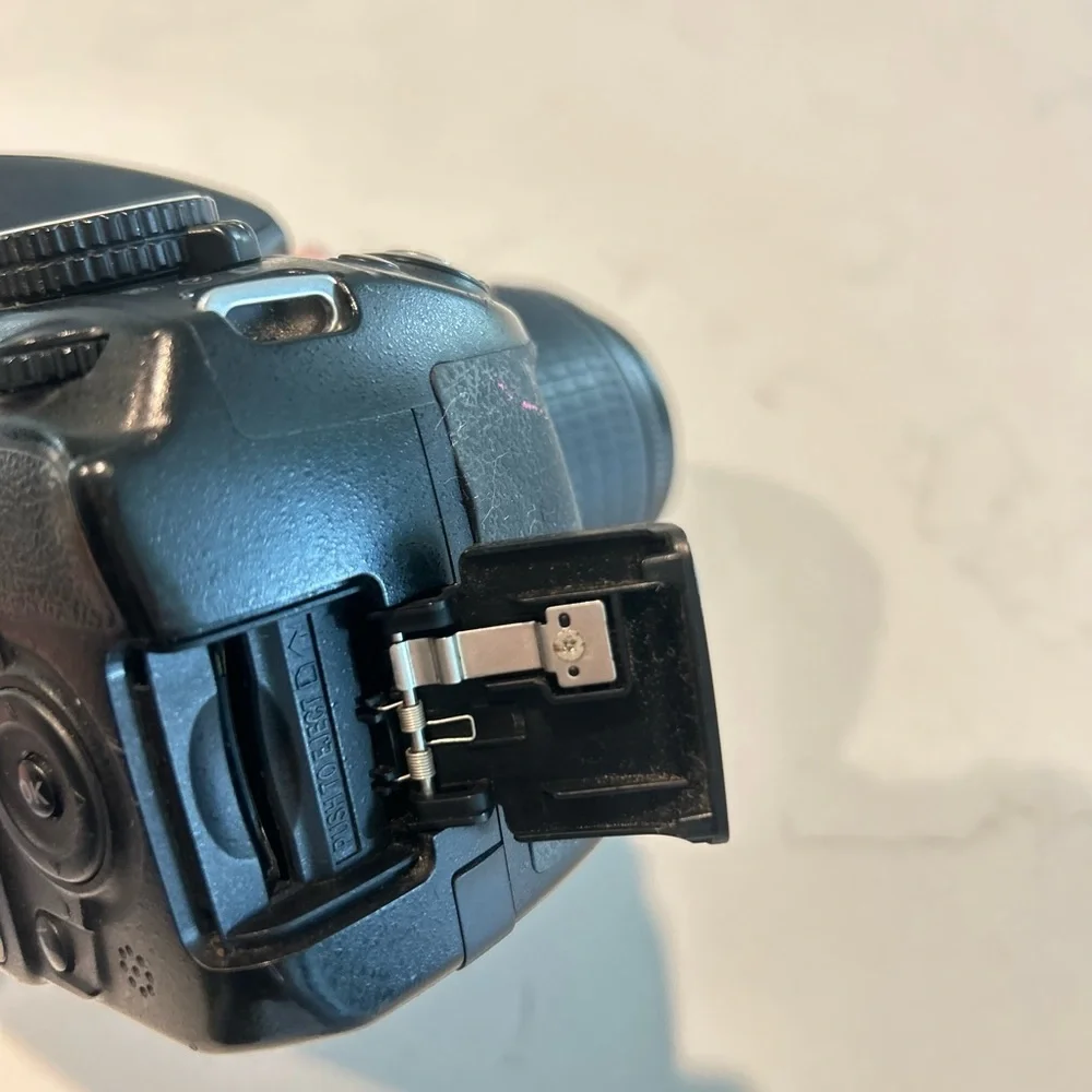 Nikon D3100 DSLR Camera with 55-200mm lens